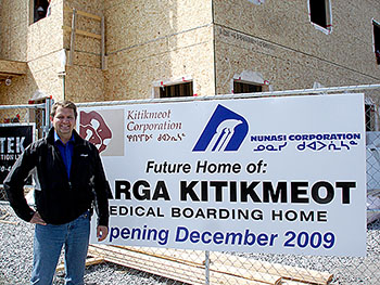 Tim Zehr, the president and COO of Nunasi Corp., stands in front of the future Larga Kitikmeot patient residence, which will be a homey place, he promises. (PHOTO BY JANE GEORGE)
