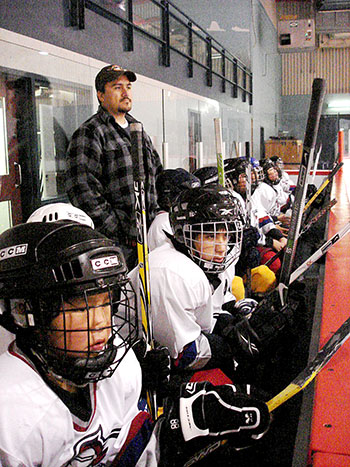 Paul Parsons, shown here with hockey players at the Kuujjuaq Forum, is the only mayoral candidate in Kuujjuaq so far. If there are no other candidates nominated by Oct. 28, Parsons will be acclaimed as mayor of Nunavik's largest community on Nov. 4, when municipal elections will be held throughout the region. (FILE PHOTO)