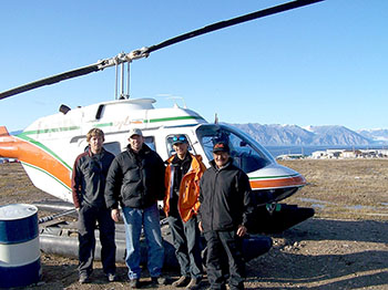 This team of scientists and hunters flew around Pond Inlet earlier this year by helicopter to survey polar bears. (PHOTO COURTESY OF WWF) 