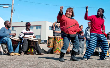 Performers and spectators enjoy the show outside the Alianait tent on Canada Day last year. (PHOTO BY ED MARUYAMA)