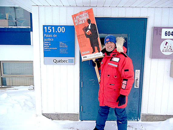 Crown prosecutor Frédéric Bénard walks a picket line outside the Kuujjuaq courthouse Feb. 8 (SUBMITTED PHOTO).