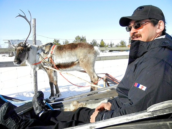 Ross Tatty of Rankin Inlet, the chair of the Kivalliq Regional Wildlife Federation, gets set to take a ride on reindeer sleigh March 29 during a visit 
to the Kittilä district of northeastern Finland, where Agnico-Eagle Mines  operates a gold mine similar to their proposed Meliadine mine near Rankin Inlet. (PHOTO BY JIM BELL)