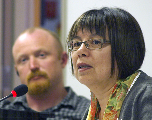 Coun. Mary Wilman speaks during an Iqaluit city council meeting April 26 as Coun. Romeyn Stevenson looks on. Wilman and Stevenson expressed concerns about the city wading into federal politics with a motion condemning the Green Party's opposition to the bowhead whale hunt. (PHOTO BY CHRIS WINDEYER)