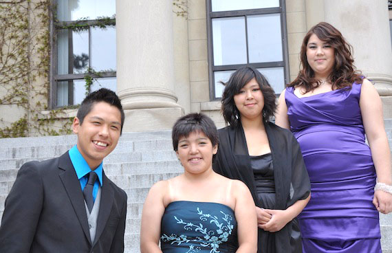 Nunavut Sivuniksavut graduates Danny Ishulutak, Kyra Nakkitok, Caitlin Pangon and Amelia Ipkornerk in front of Taberet Hall at the University of Ottawa May 15, where they received diplomas after completing an eight-month training program. Family, friends and former students gathered for a graduation ceremony and banquet for the 18 outgoing NS students. (PHOTO BY SARAH ROGERS)