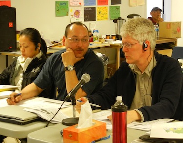 Michael Cameron, president of the Kativik Municipal Housing Bureau,  and Watson Fournier, KMHB manager, consult during last week’s discussions on housing at the  Kativik Regional Government council meeting in Kangirsuk. (PHOTO BY JANE GEORGE)
