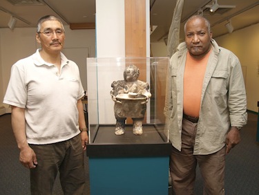 Matchbox Gallery artists Pierre Aupilardjuk and Jim Shirley are seen June 23 during preparations for the gallery's exhibit opening in Iqaluit June 25. (PHOTO BY CHRIS WINDEYER)