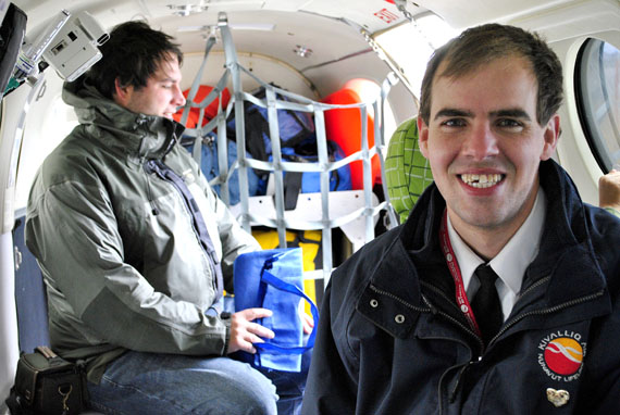 Pilot Walter von Arragon inside a King Air 200 adapted for use as a flying ER centre by the Nunavut Lifeline medevac service that Kivalliq Air operates out of Iqaluit. Each of Nunavut Lifeline's aircraft, which also include a Learjet and a Pilatus C-12, carry cardiac monitors, oxygen tanks, stretchers, a portable lab, medications and other supplies used to treat emergency medical patients en route to hospitals in the south. Kivalliq Air displayed its aircraft Aug. 13 at the Iqaluit Air Show. (PHOTO BY JIM BELL)