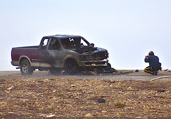 A collision in Cambridge Bay has left people in the town shocked and grief-stricken: at about 3 p.m. on Sept. 13, a dirt bike carrying two teenaged boys collided with a truck driven by an adult and three passengers on a gravel road near the airport. The truck and bike then caught fire, which members of the Cambridge Bay fire department extinguished. The collision resulted in the death of the 14-year-old boy, who was the driver of the dirt bike, RCMP confirmed Sept. 14. (SUBMITTED PHOTO)
