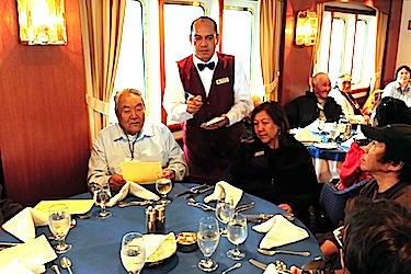 Elders and community leaders came on board the Clipper Adventurer for an elegant meal when the cruise ship docked Sept. 21 in Kangiqsualujjuaq. (PHOTO BY PASCAL POULIN)