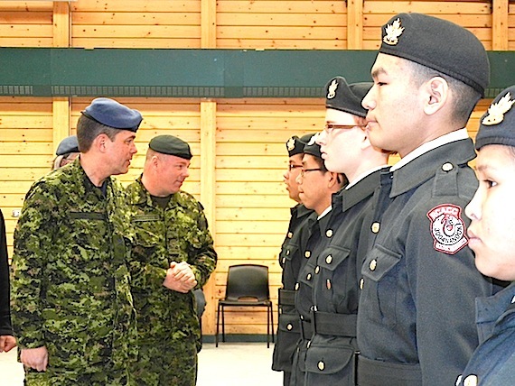 Brigadier-General Guy Hamel, at the far left, commander of the Joint Task Force North in Yellowknife, speaks Oct. 17 to members of the 3004 Nanook Royal Canadian Army Cadet Corps in Cambridge Bay's Luke Novoligak community hall. From Oct. 17 to 21, Hamel plans to visit several communities in Nunavut, including Kugluktuk, Cambridge Bay, Resolute Bay, Qikiqtarjuaq, Iqaluit, Pond Inlet, Taloyoak, Igloolik, Hall Beach and Baker Lake. In each community, Hamel will meet with Canadian Ranger, Junior Ranger patrols, and cadets. Staff and cadets of 795 Iqaluit Squadron Royal Canadian Air Cadets plan to host Hamel and Edna Elias, the commissioner of Nunavut, for a parade at Iqaluit's Cadet Hall on Oct. 18 at 6:30 p.m. The event, which is open to members of the public, will include cadet award presentations, promotions, and the signing of a proclamation installing  Elias as the 