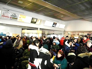 Rankin Inlet's airport terminal — which becomes overcrowded nearly every afternoon when flights converge at the airport — will be expanded as part of a multi-million dollar airport upgrade and improvement project. (FILE PHOTO)