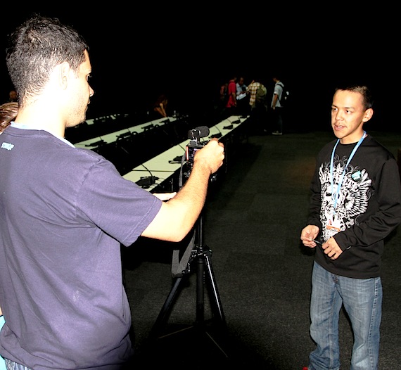 Jordan Konek of Arviat speaks to an aboriginal Australian reporter about the Nanisiniq Arviat history project Dec. 5 in Durban, South Africa, where he and Curtis Kuunaq are attending the United Nations climate change conference. (PHOTO BY FRANK TESTER)