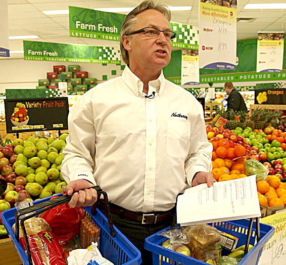 Michael McMullen, the executive vice president of the North West Co., poses inside Iqaluit's Northmart store this past April 1, the day the Nutrition North Canada program started up. (FILE PHOTO)