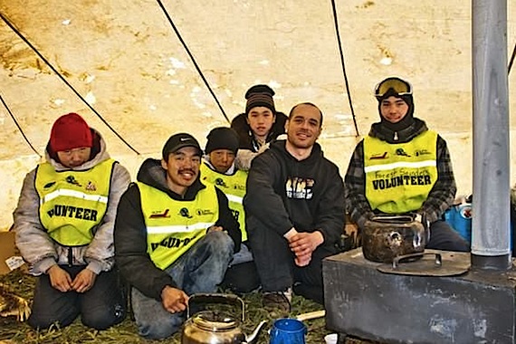 Students from Jaanimmarik School's  Individual Path of Learning program kept the tea hot for mushers in Nunavik's Ivakkak dog team race as they arrived in Kuujjuaq March 14 and 15 for a one-day lay-over that lasted two days due to stormy conditions. On March 16, Peter Kiatainaq's team was in the lead.  (PHOTO BY PIERRE DUNIGAN/ COURTESY OF MAKIVIK CORP./ IVAKKAK)