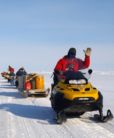 Canadian Rangers on their snowmobiles parade in front of visitors during the 2010 Operation Nunavlivut in Alert. (FILE PHOTO)