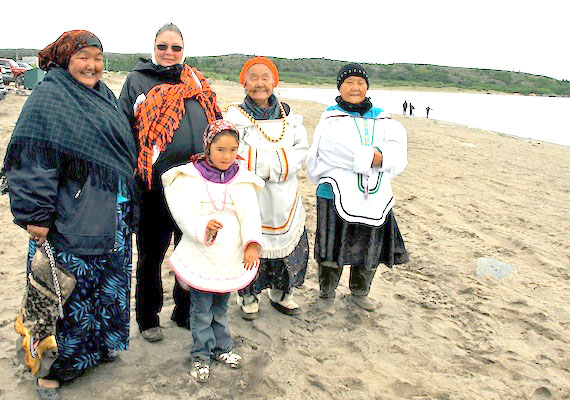 Kuujjuamiut Emma Kudluk, Ella White and daughter Louisa, Kitty Bedard and Harriett Saunders dress in their traditional clothing to celebrate June 21, National Aboriginal Day. Among the other activities organized by the local recreation committee Kuujjuaq Pingnguatitsijingit: a fishing contest for the longest/biggest and smallest fish, canoe paddling races, and games held outdoors on the beach. There was also a cake contest at the arena and a bingo with a $5,000 jackpot. At the June 21 festivities, many prizes were drawn, including plane tickets, one from First Air and one from Air Inuit, and many other prizes, such as camping equipment, electronics and bicycles. (PHOTO BY ISABELLE DUBOIS)