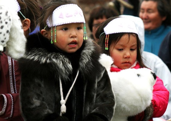 These girls are dressed up for the Celebration of the Seal festivities June 22 in Iqaluit. Many who attended the celebration, held from 6 p.m. to 9 p.m. in Sylvia Grinnell territorial park, wore sealskin clothing  — and everyone feasted on fresh seal. To see more photos, go to Nunatsiaq News' Facebook photo album at http://on.fb.me/NtAA8g. (PHOTO BY DAVID MURPHY) 