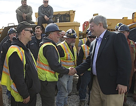 Prime Minister Stephen Harper meets Aug. 21 with miners in Yukon. 