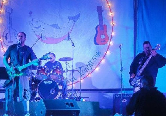 After a six year break, Kuujjuaq's Angava band, shown here at the recent Arctic Char festival in Kangirsuk, is back. The group, which includes original band members Derek and Willis Tagoona and new bass player Adamie Alaku, performs Aug. 14 during the opening night concert of the Aqpik Jam musical festival in Kuujjuaq. Read more about the festival on Nunatsiaqonline.ca. (HANDOUT PHOTO)
