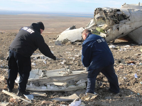 Transportation Safety Board investigators comb the hillside near the airport in Resolute Bay a week after First Air flight 6560 crashed there at about 11:42 a.m. on Aug. 20, 2011. On the first anniversary of the crash, which killed 12 and injured three, employees of First Air will observe a moment of silence at 11:42 a.m., while in Resolute Bay, family members and friends of those who perished on the flight plan to unveil a monument in their memory. The Transportation Safety Board continues to investigate the causes of the crash. In the Letters section of Nunatsiaqonline.ca, you can read 