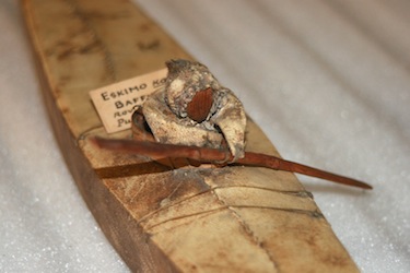 This kayak model is among the miniatures collected in Cumberland Sound by Rev. Edmund James Peck between 1894-1905. (PHOTO COURTESY OF THE PITT RIVERS MUSEUM, OXFORD UNIVERSITY)