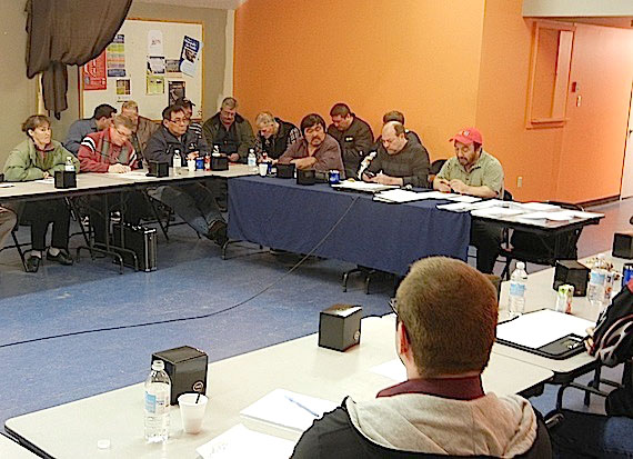 The Nunavut Association of Municipalities is getting back on its feet. That's the message Oct. 16 from Paul Hauli, (at the back to the right, in the red ball cap) the mayor of Hall Beach and NAM's president, to senior administrative officers from around Nunavut attending the annual Nunavut Association of Municipal Administrators' meeting in Iqaluit. Hauli said NAM's funding from the hamlets and the Government of Nunavut has increased, so the association will be able to recruit and competitively pay a new executive director. That executive director, who should be in place by the end of the year, will be based in Igloolik, where office space and housing have been secured. For nearly three years, the NAM has struggled with little or no staff and constant turnover within its board. Now, Hauli said, NAM's new board won't dwell on the past. 