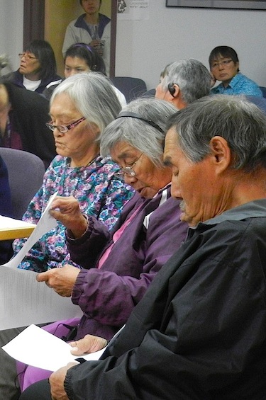 Elders go over their notes for what they want to tell delegates at the Kitikmeot Inuit Association's annual general meeting Oct. 4 in Cambridge Bay. (PHOTO BY JANE GEORGE)