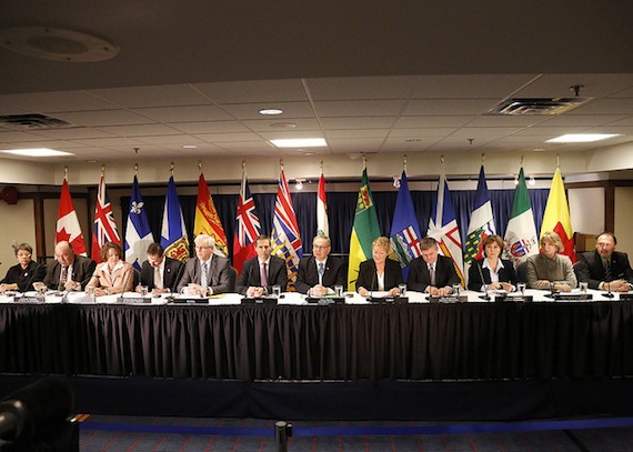 Nunavut Premier Eva Aariak sits at the far left, and Quebec Premier Pauline Marois, fifth from the right, Nov. 23 at a news conference in Halifax where Canadian premiers gathered to discuss economic issues. (PHOTO COURTESY COF)