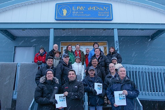 Representatives from Nunavik, Nunatsiavut and the ArcticNet research network stand outside the Makivvik Corp. office in Kuujjuaq where the report,