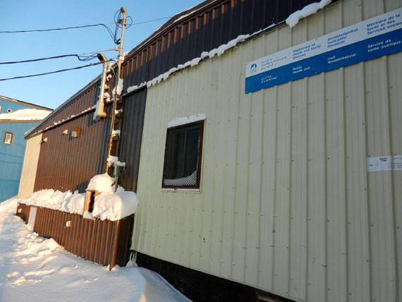 Building 155 in Iqaluit, which for decades served as a community public health centre, still lies empty and unused Nov. 30 after closing this past June for an environmental remediation that was expected to take only four months. Now, the Government of Nunavut has decided Iqaluit residents won’t be getting public health services at this building anymore. Instead, the Iqaluit Public Health and Family Practice will move to building 1091, located near the creek on the airport road. Public health services will close Dec. 6 and Dec. 7 to prepare for the move. Public health services, including flu shots, tuberculosis programs, sexual health clinics, well child appointments, and nurse practitioner appointments will resume Dec. 10 at building 1091. A GN spokesperson said the health department will likely hold a press event Monday to explain a series of service relocations that will occur in Iqaluit, partly due to renovations at the old hospital building. (PHOTO BY JIM BELL)