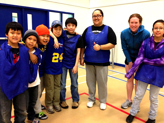 Inside the Levi Angmak Elementary School, kids in Arviat take a break from practicing soccer drills and life skills in a program called Soccer for Hope.  For the past two weeks, they’ve been going to the gym every day, bringing their friends, and the group has grown from 25 kids to about 50. Coach Kukik Baker, shown here, is a volunteer who learning how to facilitate the program. “It’s for the kids, not for anything else. It’s for the kids so they have something positive to do,” she said. She’s getting trained by organizers at Hoops for Hope, a program similar to those that run in Zimbabwe and South Africa for kids who have trouble finding equipment to play sports as simple as soccer or basketball. Read more later on Nunatsiaqonline.ca (PHOTO COURTESY OF M. CRANDALL) 