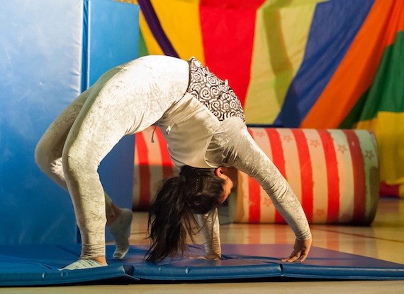 A young performer at Ulluriaq School in Kangiqsualujjuaq displays some of what she's learned from Nunavik's Cirqiniq circus arts program during a Feb. 15 performance of 
