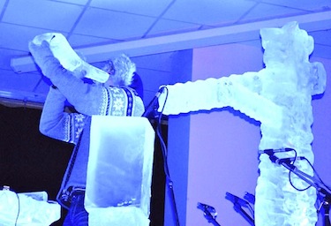 Ice musician Terje Isungset plays one of his ice horns at his Feb. 19 concert at Iqaluit's Inuksuk High School. (PHOTO BY JANE GEORGE)