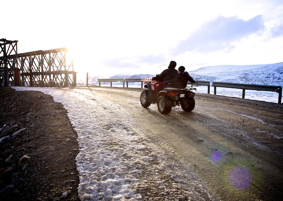 Goodbye winter and snowmobiles, hello spring and all-terrain vehicles: people in Pangnirtung get out their ATVs March 18 when temperatures in the community reached 6.5 C — 24 degrees above the normal high temperature for that day. Read more about the recent warmer-than-average and often record-breaking temperatures in the eastern Arctic on Nunatsiaqonline.ca. (PHOT0 BY SARAH MCMAHON)