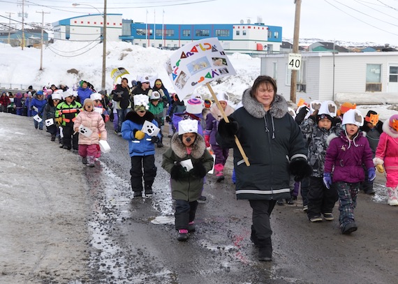 Children and staff at Pitakallak elementary school in Kuujjuaq march down from the school in an afternoon parade March 25 to launch their winter carnival. (PHOTO BY ISABELLE DUBOIS)