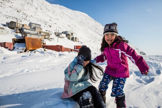 Meet your neighbours on the other side of the world: Inuit on Little Diomede island in the Bering Strait, where these girls play on the sea ice. Read more about life on Little Diomede on Nunatsiaqonline.ca in a special feature story courtesy of the Alaska Dispatch. ((PHOTO BY LOREN HOLMES/ALASKA DISPATCH)