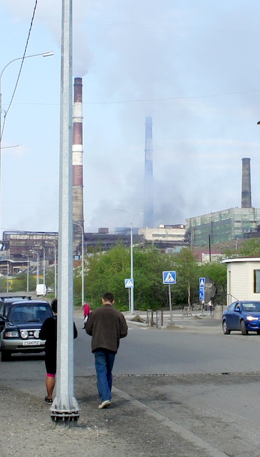 The stacks from Norilsk Nickel’s nickel plant loom large over the town of Nikel, in western Russia's Arctic Kola Peninsula. (PHOTO BY ALEX BOYD)