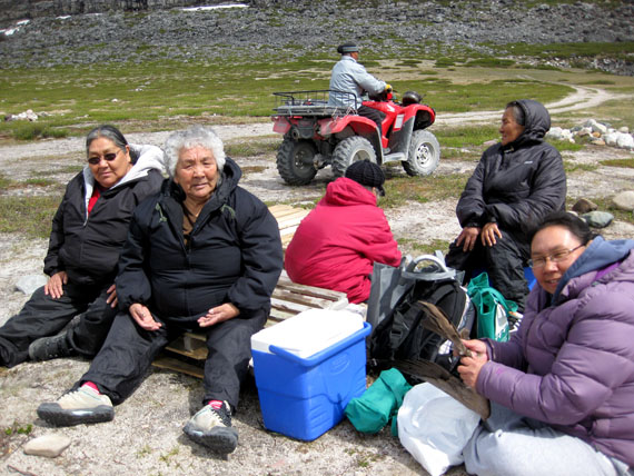 Umiujaq elders take a break from activities, including a picnic, scheduled in the Nunavik community on June 15, World Elder Abuse Awareness Day. Activities included the picnic at the new provincial park near the Richmond Gulf, Parc national Tursujuq, along with games at the community centre, which included ticket draws, bowling, indoor hockey, dice games. In one game, the elders teamed up with youth to see who could collect the most 