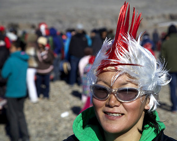 Marie Barnabas, a member of the Hamlet of Arctic Bay's recreation staff, gets into the spirit of Canada Day during July 1 celebrations in her community. (PHOTO BY CLARE KINES)