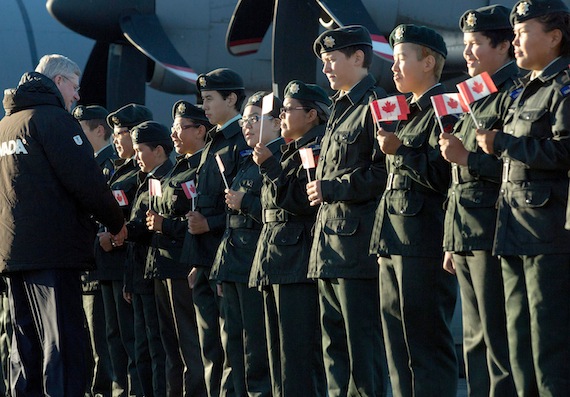 Local cadets greet Prime Minister Stephen Harper on his arrival in Rankin Inlet Aug. 21. Inuit leaders from across the Arctic have flown to Rankin Inlet to hold a big meeting with Harper Aug. 22. Inuit Tapiriit Kanatami said leaders will talk to Harper about non-renewable resources and economic development; housing; marine shipping; search and rescue; and skills development and training.  Each leader has been assigned a specific topic. Leaders at the meeting include Inuit Tapiriit Kanatami president Terry Audla, Inuit Circumpolar Council-Canada president Duane Smith, Inuvialuit Regional Corp. chair Nellie Cournoyea, Makivik Corp. president Jobie Tukkiapik, Pauktuutit president Rebecca Kudloo, National Inuit Youth Council president Thomas Anguti Johnson, Nunatsiavut government president Sarah Leo, Kivalliq Inuit Association president David Ningeongan, Nunavut premier Eva Aariak and Nunavut Tunngavik Inc. president Cathy Towntongie. You can follow today's events on Nunatsiaqonline.ca and see more photos from Rankin Inlet on Nunatsiaqonline.ca and the Nunatsiaq News Facebook page. (PHOTO COURTESY OF JASON RANSOM, PMO)