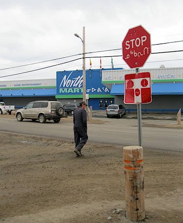 Following an accident that took a four-year-old boy’s life near a busy intersection in Iqaluit July 29, city councillor Joanasie Akumalik proposed Aug. 13 that the city paint crosswalks for pedestrians at Iqaluit’s busiest intersections, such as this one in front of Northmart. (PHOTO BY PETER VARGA)