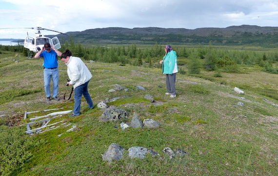 The family of Maggie Gordon looks at the graves near the site of the old trading posts of the Hudson Bay and Revillon Frères trading posts near Tasiujaq during an Aug. 14 visit. (PHOTO COURTESY OF ALLEN GORDON)
