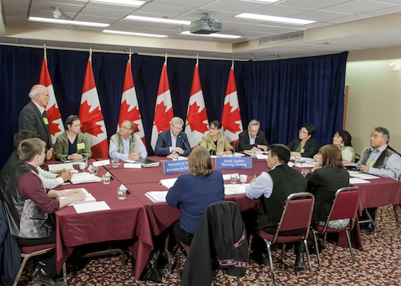 Members of the board of Inuit Tapiriit Kanatami gets ready to discuss issues such as housing Aug. 22 in Rankin Inlet with Prime Minister Stephen Harper and other federal officials during the 