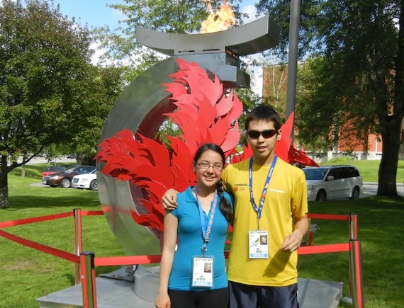 Joy Aragaluk of Kuujjuaraapik and Yaaniapik Cain of Tasiujaq stand in front of the Canada Summer Games flame Aug. 8. Read more about a special Inuit cultural event hosted by youth 