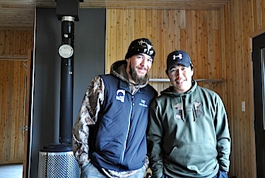 Kangiqsualujjuaq residents Jimmy Chevrier, left, a Kuurujuaq park warden and Charlie Annanack, an assistant, worked out of the park’s base camp this summer. Most of the park’s staff come from nearby Kangiqsualujjuaq and speak three languages. (PHOTO BY SARAH ROGERS)