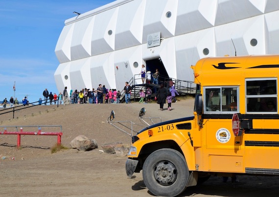Back to school! A school bus waits outside Nakasuk School in Iqaluit Sept. 3 for a lunchtime pick-up on the first day of school. Classes have now started at the majority of schools in Nunavut. (PHOTO BY DAVID MURPHY)