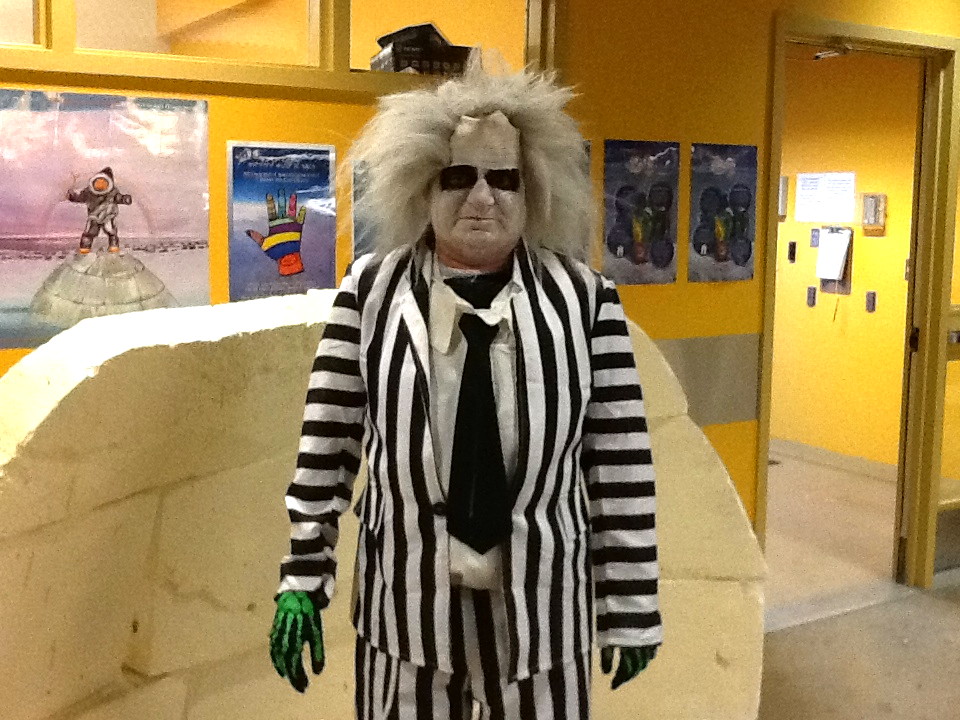 Iqaluit bus driver Ron Brodie gets into the Halloween spirit with this Beetlejuice outfit and a bus decorated spooky style for students. Drivers: remember to keep an eye out for little ghouls and goblins trick-or-treating tonight. (PHOTO BY SONJA LEBLANC)