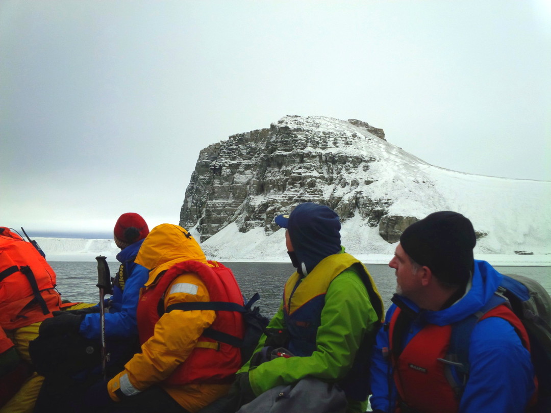 Passengers say farewell to Karrat Island, off the Greenland coast, on an August 2013 cruise called 