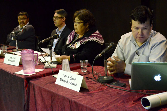 The four people contesting the Iqaluit-Manirajak seat in the Oct. 28 Nunavut election — from left, Paulie Sammurtok, Lewis Lehman, Monica Ell and Mikidjuk Akavak — take questions from voters at  a candidates forum that started at 12 noon Oct. 26 inside the Iqaluit francophone centre. Residents who can't make it to the event may listen to a live broadcast on CFRT at 107.3 on the FM band. The riding-by-riding forum will continue until 5:45 p.m. (PHOTO BY JIM BELL)