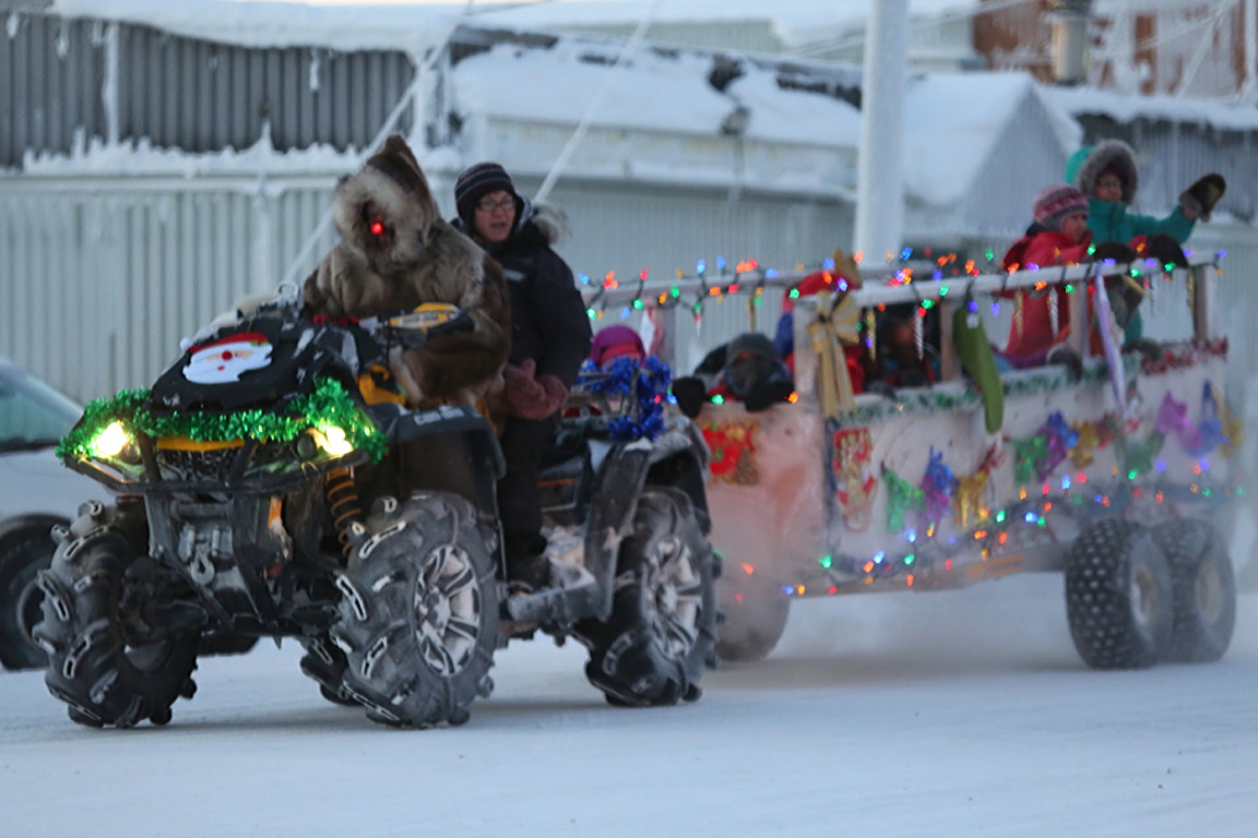 Let the festive season begin! Cambridge Bay residents got a jump on the holiday season Nov. 30 with a parade through town that attracted plenty of floats and spectators. Many floats came away winners this year including the Cambridge Bay Childcare Society, shown here. Other awards include: best snowmobile-ATV — Jaida Edwards Ohokannoak; best family float — William P. And Annie A.; best corporate float — Jago; largest float — Kitnuna; best children's float — Cambridge Bay Childcare Society; best dressed pet — Brenda and Avery. Honourable mentions went to Nunavut Arctic College, Santa, Markus and Miller, Joan and Karen, Chuck and Vanessa and Allen Navalalok Kanayok. (PHOTO BY RED SUN PRODUCTIONS)